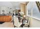 Cozy breakfast nook with natural light, a round table, four chairs, and views of the living area at 4612 35Th E Ave, Palmetto, FL 34221