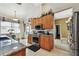 Granite countertops, stainless steel appliances, and wood cabinets make for a modern kitchen at 4612 35Th E Ave, Palmetto, FL 34221