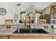 Kitchen sink and granite counters leading to dining and living spaces with natural light and neutral paint at 4612 35Th E Ave, Palmetto, FL 34221