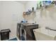Clean and functional laundry room featuring modern appliances and ample storage at 4612 35Th E Ave, Palmetto, FL 34221