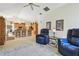 Open-concept living room and kitchen area with a comfortable seating area and modern appliances at 4612 35Th E Ave, Palmetto, FL 34221