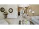 Spacious living room with neutral walls, chandelier and views into the formal dining room at 4612 35Th E Ave, Palmetto, FL 34221