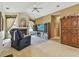 The living room features a fireplace, large windows and views from the front door at 4612 35Th E Ave, Palmetto, FL 34221