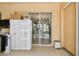 The sunroom has tile floors, storage cabinets, and sliding doors that open to the backyard at 4612 35Th E Ave, Palmetto, FL 34221
