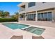 Beautiful backyard with pool, spa, and covered patio overlooking the water at 5110 W Longfellow Ave, Tampa, FL 33629