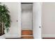 Interior elevator with an open door showcasing the wooden floors and neutral decor at 5110 W Longfellow Ave, Tampa, FL 33629