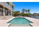Exterior featuring a stunning swimming pool, patio lounge and dining furniture, and lush tropical landscaping at 5110 W Longfellow Ave, Tampa, FL 33629