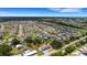 Spacious property aerial view in established neighborhood; enjoy community, convenience and charm at 5250 Brody Blvd, Wimauma, FL 33598