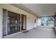 Covered patio with sliding glass doors leading inside at 5250 Brody Blvd, Wimauma, FL 33598