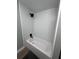 Bright bathroom features tiled walls and sleek, modern fixtures at 5654 12Th St, Zephyrhills, FL 33542