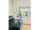 Updated kitchen featuring granite countertops, stainless steel sink, and modern faucet at 5654 12Th St, Zephyrhills, FL 33542