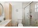 Bathroom features a glass enclosed shower and neutral tile at 708 Rutgers Pl, Sun City Center, FL 33573