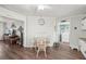 Dining area next to laundry with light and ample seating at 708 Rutgers Pl, Sun City Center, FL 33573
