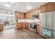 Well-equipped kitchen featuring stainless steel appliances and ample cabinet space at 708 Rutgers Pl, Sun City Center, FL 33573