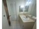 Bathroom featuring a single sink vanity at 7125 Silvermill Dr, Tampa, FL 33635
