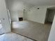 Living room featuring a fireplace and vaulted ceilings at 7125 Silvermill Dr, Tampa, FL 33635