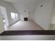 Living room with a fireplace and large window at 7125 Silvermill Dr, Tampa, FL 33635