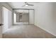 Spacious bedroom with mirrored closet doors and neutral carpet at 739 1St Ct, Palm Harbor, FL 34684