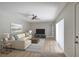 Inviting living room with neutral tones, a comfortable sectional sofa, and natural light at 739 1St Ct, Palm Harbor, FL 34684