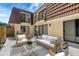 Comfortable outdoor living featuring stylish patio furniture in the enclosed patio at 739 1St Ct, Palm Harbor, FL 34684