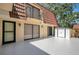 Back patio with room for outdoor activities and storage shed at 739 1St Ct, Palm Harbor, FL 34684