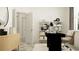 Home office space with modern desk and shelving, complemented by a light wood floor at 7541 E 116Th St, Palmetto, FL 34221