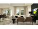 Bright living room featuring modern furnishings, large windows, and neutral tones creating a relaxing atmosphere at 7541 E 116Th St, Palmetto, FL 34221