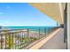 Balcony with stunning beach views and ample space for seating at 7600 Bayshore Dr # 1201A, Treasure Island, FL 33706