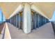 Corner balcony provides panoramic views, complemented by durable flooring and security railings at 7600 Bayshore Dr # 1201A, Treasure Island, FL 33706