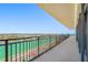 Balcony offers sweeping views of the city skyline, water, and tennis courts at 7600 Bayshore Dr # 1201A, Treasure Island, FL 33706