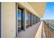 Wide balcony with metal railings offering stunning city and water views at 7600 Bayshore Dr # 1201A, Treasure Island, FL 33706