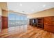 Spacious bedroom featuring custom wood paneling and shelving, with a large window offering ocean views at 7600 Bayshore Dr # 1201A, Treasure Island, FL 33706