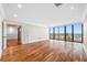 Spacious living room features floor to ceiling windows with stunning views at 7600 Bayshore Dr # 1201A, Treasure Island, FL 33706
