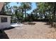 Spacious backyard featuring a concrete patio and a lush landscape at 8059 26Th N Ave, St Petersburg, FL 33710