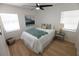 Inviting bedroom features a ceiling fan, natural light, and stylish decor for a peaceful oasis at 8059 26Th N Ave, St Petersburg, FL 33710