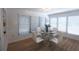 Dining Area boasts a modern table setting, ample windows and natural light at 8059 26Th N Ave, St Petersburg, FL 33710