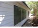 Home exterior with brick walkway and windows providing natural light at 8059 26Th N Ave, St Petersburg, FL 33710