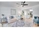 Inviting living room offers stylish decor, an open floor plan, and plenty of natural light at 8059 26Th N Ave, St Petersburg, FL 33710