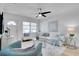 Light-filled living room with stylish furnishings, including an eye-catching rug and comfortable seating at 8059 26Th N Ave, St Petersburg, FL 33710