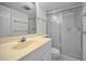 Bathroom features a walk-in shower with sliding glass doors and tile flooring at 865 S Gulfview Blvd # 202, Clearwater Beach, FL 33767