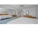 Spacious bedroom with mirrored closet and waterfront view in vintage beach condo at 865 S Gulfview Blvd # 202, Clearwater Beach, FL 33767