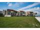 Spacious condo building with lush landscaping and views of the beautiful beach at 865 S Gulfview Blvd # 202, Clearwater Beach, FL 33767