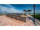 Community grilling area with multiple grills for residents to enjoy with beach views at 865 S Gulfview Blvd # 202, Clearwater Beach, FL 33767