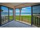 Enjoy the outdoors from this enclosed patio with bay views, tile flooring, and sliding glass doors at 865 S Gulfview Blvd # 202, Clearwater Beach, FL 33767
