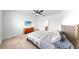 This bedroom offers neutral carpeting, ceiling fan and muted colors at 9293 Rally Spring Loop, Wesley Chapel, FL 33545