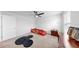 Bright bedroom features modern ceiling fan and a race car bed at 9293 Rally Spring Loop, Wesley Chapel, FL 33545