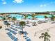 Beautiful beach-themed community pool featuring water inflatables, slides, sun umbrellas, and plenty of lounge chairs at 9293 Rally Spring Loop, Wesley Chapel, FL 33545