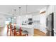 Beautiful kitchen island with pendant lighting and stainless steel appliances at 9293 Rally Spring Loop, Wesley Chapel, FL 33545