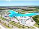 Experience the community lagoon featuring pristine beaches, a lively waterpark, and amenities for leisure and recreation at 9293 Rally Spring Loop, Wesley Chapel, FL 33545