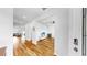 Bright living room with hardwood floors and a ceiling fan at 9293 Rally Spring Loop, Wesley Chapel, FL 33545